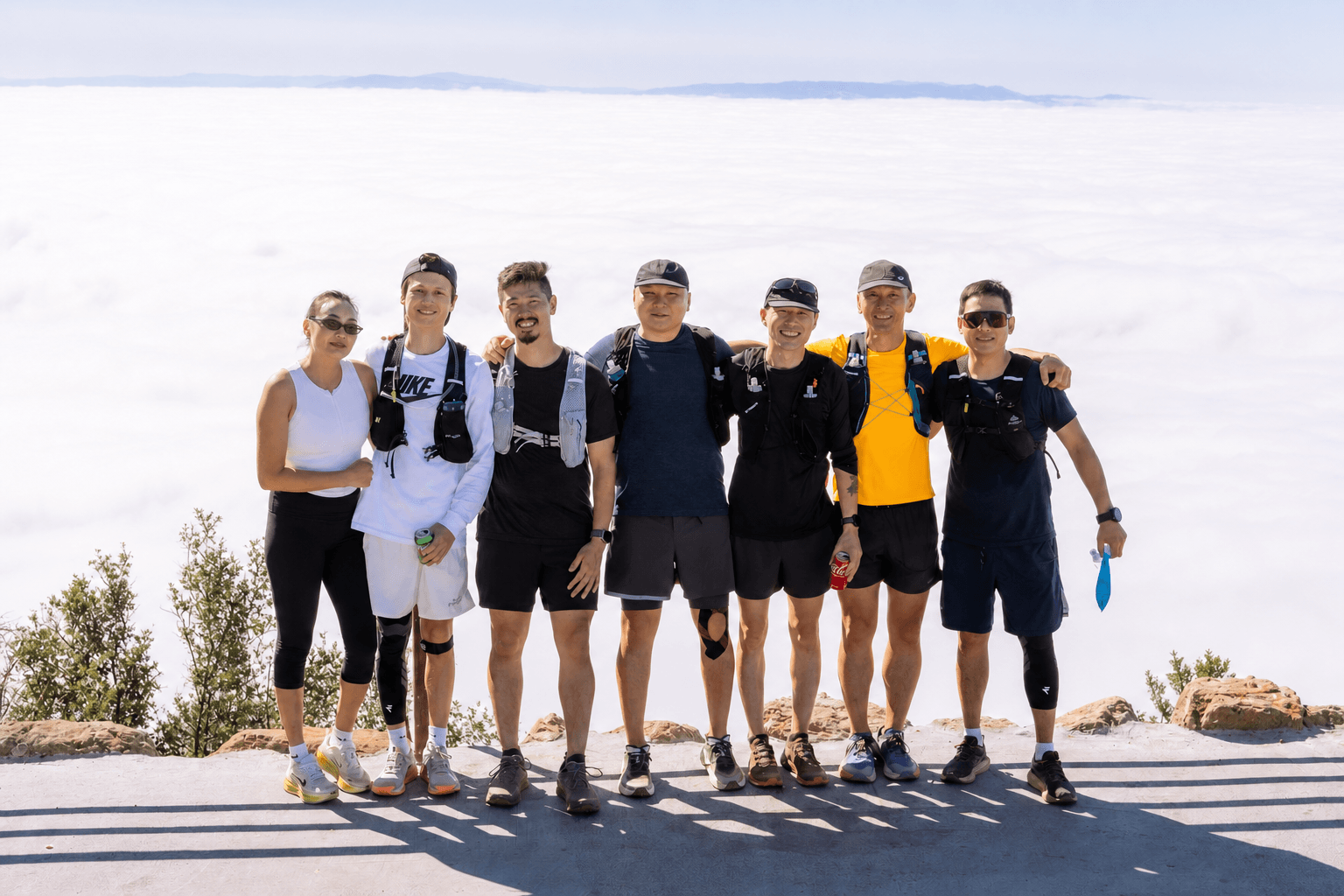 Iron Horse Run Club runners together at a mountain overlook